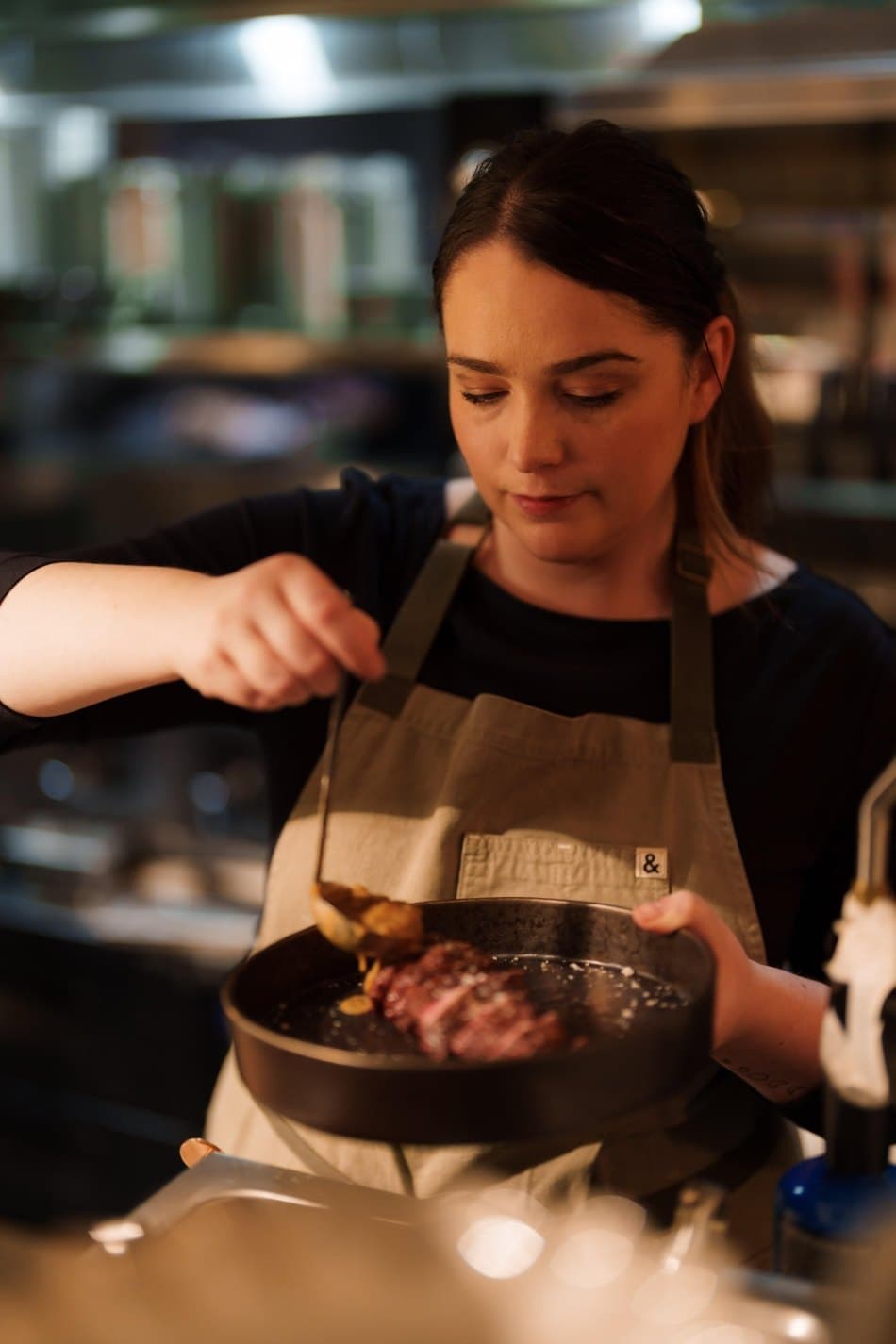 Chef preparing food at Terra Mae