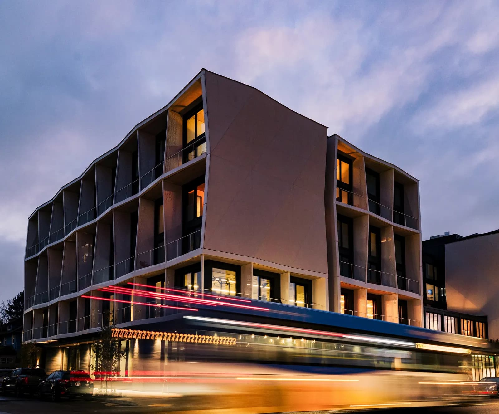 CASCADA’s Portland building glowing at dusk